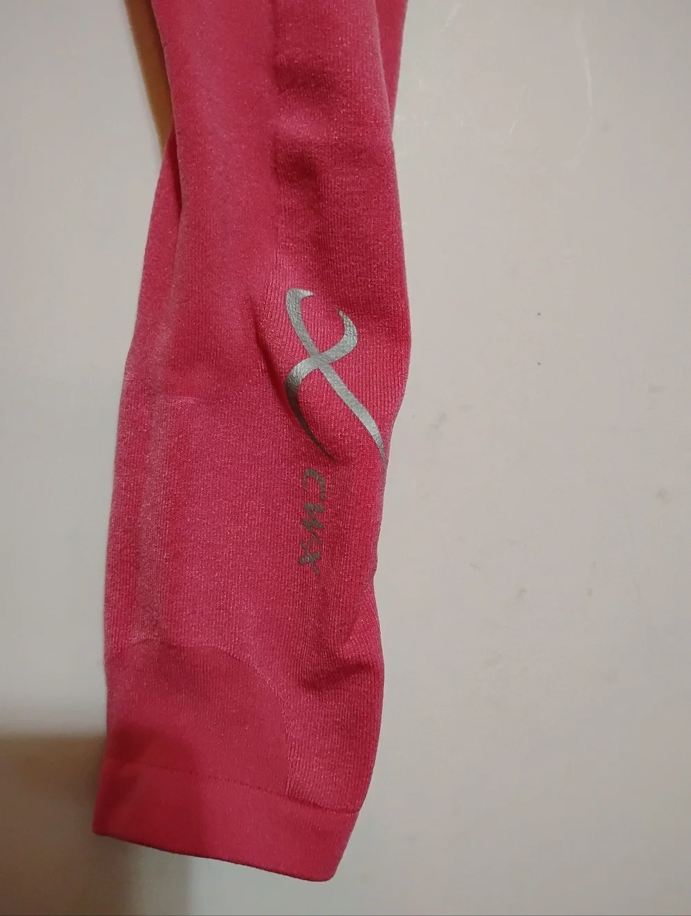 CW-X Hot Pink Compression Arm/Leg Sleeves